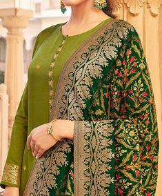 COLOR : Bright Olive Green & Dark Green FABRIC : Top - Dola Jacquard, Bottom - Santoon, Dupatta - Dola Jacquard WORK : Woven Zari, Tassels, Digital Print OCCASION : Party Wear, Festival READY-TO-WEAR : No STITCHING : Available as semi-stitched fabric, can be stitched using standard size option (+$20). Note: There might be a slight color variation due to lighting and flash used during photoshoot. The bright shade seen is the best closer view of fabric's color. Bright Olive Green, Dark Green Fabric, Indian Fashion Trends, Simple Pakistani Dresses, Pant Suit, Suit Fabric, Indian Designer, Indian Designer Wear, Green Dark