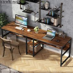 a computer desk with two laptops on top of it and shelves above the desk