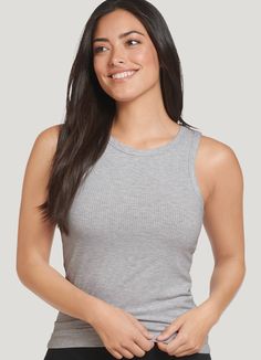 For yoga, summer days, or just hanging around the house, the Jockey® High Neck Rib Knit Tank is the tank you'll always reach for. Silky-soft fabric with a bit of stretch offers a flattering fit that feels great, right down to the tag-free neckline. With a length that's just right, pair this easy tank with everything from leggings to jeans for a casual look that just works. | Jockey® High Neck Rib Knit Tank in Light Grey Heather Knit Tank, Knit Tanks, Feeling Great, Summer Days, New Day, Casual Look, Soft Fabric, Rib Knit, Fitness Fashion