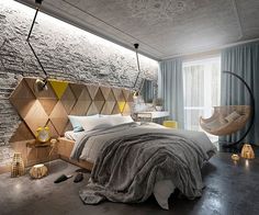 a bedroom with stone walls and flooring is shown in this image, there are lights on either side of the bed