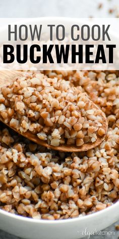 a white bowl filled with buckwheat next to a wooden spoon on top of it