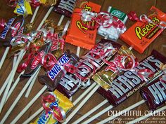 many candy bars are lined up on the table