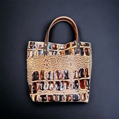 These beautiful totes are one of a kind timeless classics. They are all made with 100% genuine leather ranging from 3-5 oz. All exterior seams are double stitched. This adorable bag measures approx. 10 1/2" tall, approx. 12 1/2" across the top, approx. and has a depth of approx. 5".  The handles have an approx. drop of 5". You can pick to have handles or no handles, snap or no snap, handle color and fastener color. I do not include the cross-body strap.  I use real leather for all my items, whic Leather Shoulder Bag With Handles In Cognac, Cognac Leather Shoulder Bag With Handles, Brown Textured Vegetable Tanned Leather Bags, Cognac Leather Tote Shoulder Bag, Cognac Leather Shopping Bag, Luxury Large Shoulder Bag With Leather Handles, Brown Textured Leather Coated Canvas Shoulder Bag, Brown Leather Satchel With Double Handle, Luxury Vegetable Tanned Leather Shoulder Bag With Double Handle