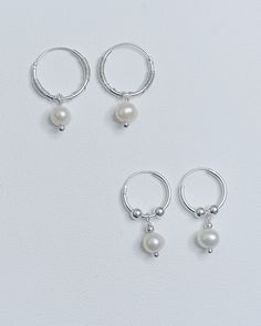 Sterling Sikver Hoops Decorated with Fresh Water Pearls Everyday Sterling Silver Hoop Pearl Earrings, Small Hoop Silver Earrings With Pearl Charm, Elegant Silver Hoop Earrings With Pearl Charm, Silver Pearl Hoop Earrings With Pearl Charm, Handmade Silver Hoop Pearl Earrings, Handmade Silver, Sterling Silver Earrings, Freshwater Pearls, Silver Earrings