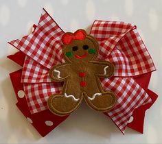 "ADORABLE GINGHAM GINGERBREAD GIRL BOW! **The size of the pictured bow is 5 inches, but can be ordered in other sizes with the same shipping time. Hair bows may be made with a french barrette, an alligator clip (as shown), or a hair tie. ITEM DETAILS: *Ribbon Type: Base Layer- red with white dots Top Layer-red and white gingham Embellished with a pretty embroidered gingerbread girl *BOW DIMENSIONS: 4.5, 5\", or 6\" *CLASP: French Barrette or Alligator Clip *Edges are heat sealed to prevent frayi Bow Christmas, Gingerbread Girl, Christmas Bow, Packaging Gift, French Barrette, Pretty Packaging, Red Gingham, Red Polka Dot, Christmas Bows