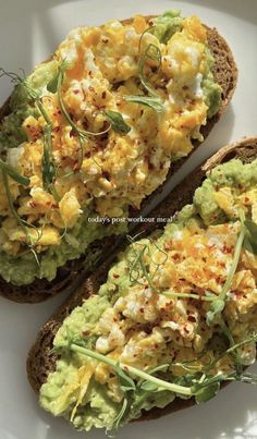 an open faced sandwich with avocado and scrambled eggs on it is shown here