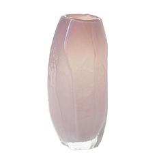 a pink vase sitting on top of a white table