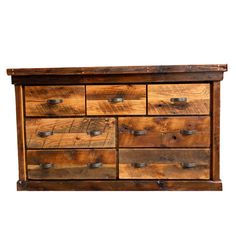 a wooden dresser with many drawers and knobs on the bottom drawer, against a white background