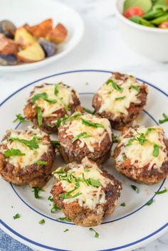 some food is sitting on a plate with other dishes in the backgroung