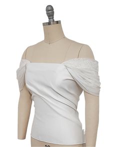 A pair of Lovely detachable sleeves made from soft elastic tulle and beaded lace. If you need more drama for your dress they can be a perfect choice and last touch for it.  The sleeves can be wear on the shoulder or off the shoulder and can be made in ivory/white/black colour.  The sleeves are attached to the dress with sew-on poppers, the one part is already sewed on them and the second part need to sew into your dress.  The processing time is 1-2 weeks but also a rush order(NO EXTRA COST) serv Fitted Tulle Mother Of The Bride Dress For Banquet, Fitted Tulle Wedding Dress For Banquet, Fitted Organza Wedding Dress With Detachable Train, Wedding Dress With Detachable Sleeves And Fitted Design, Fitted Mother Of The Bride Dress With Detachable Train, Fitted Tulle Mother Of The Bride Dress For Wedding, Fitted Organza Evening Wedding Dress, Formal Fitted Organza Wedding Dress, Fitted Organza Wedding Dress For Evening