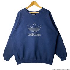 "I T E M * D E S C R I P T I O N Size : L Code : 1980-1995s Authentic Adidas Measurement (garment lying flat on the ground) - Pit :28.5\" inches (manual measurement) Length :31\" inches CONDITION : (8/10) S H I P P I N G & H A N D L I N G I WILL SHIP THE ITEMS WITHIN 1-3 DAYS AFTER CLEARED PAYMENT (EXCEPT FOR PUBLIC HOLIDAY AND WEEKEND) AND SHIP USING EXPRESS SHIPPING. EXPECTED ARRIVED IN 7-9 BUSSINESS DAYS AFTER SHIPMENT. PLEASE LEAVE YOUR PHONE NUMBER DURING PURCHASES. IT IS REQUIRED FOR DELIVERY PROCESS.. THANKS FOR VIEWING HAVE A GOOD DAY!" Sweat Adidas, Adidas Crewneck, Sweatshirt Adidas, Navy Blue Crewneck, Adidas Navy, Adidas Sweater, Adidas Sweatshirt, Embroidered Crewneck, Embroidered Sweater