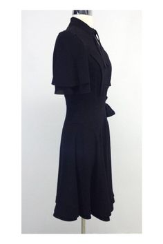 Size 6 - Runs small Black Short Sleeve Wrap Dress 100% Silk Concealed side zip Slips on Button and waist tie closure Neck tie Butterfly sleeves Has a slip Underarm to underarm 17" Waist 29" Roomy hip area Total length 40" Black Belted Midi Dress For Semi-formal Occasions, Fitted Knee-length Midi Dress With Tie Back, Fitted A-line Midi Dress With Tie Back, Fitted Black Dress With Tie Back, Fitted Knee-length Midi Dress With Bow, Fitted Midi Dress With Bow, Knee-length, Fitted A-line Midi Dress With Bow, Fitted Midi Dress With Bow, Black A-line Dress With Tie Back