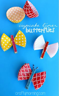 four paper butterflies on a blue background with the words cupcake liners butterflies in red, white and yellow