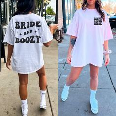 two women walking down the street, one wearing a t - shirt that says bride and boozy