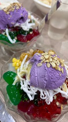 two desserts with different toppings are on a glass plate