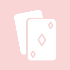 two white cards sitting next to each other on a pink background