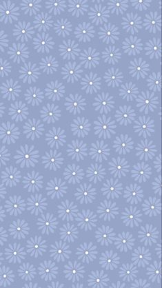 a blue and white flower pattern with dots