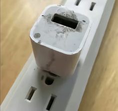 an electrical outlet is shown with the cover removed