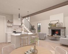 an open concept living room and kitchen area with wood flooring, white walls and ceiling