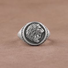 "Hercules and Nemean Lion Pinky Ring, Greek Pattern Intaglio Sterling Silver Mythology Lover Gift, Cool Warrior Ring, Zodiac Sign Leo Ring Made of 925 silver and handcrafted by hand, this ring is not only an accessory piece that complements your daily elegance, but also has details that will reflect your character and style. It is also a great gift to give to your loved ones on their special days. At SavisSilver, we always give importance to the satisfaction of our customers, we recommend you to Symbolic Rings With Oxidized Finish For Collectors, Leo Ring, Nemean Lion, Warrior Ring, Zodiac Sign Leo, Mythology Jewelry, Greek Pattern, Zodiac Signs Leo, Men Jewelry