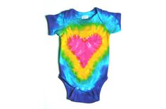 a tie dye bodysuit with a heart on it