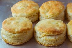 some biscuits are sitting on a plate and ready to be eaten