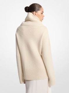 Knit from sumptuous cashmere, this oversized turtleneck sweater defines cool-weather luxury. Equally as sophisticated paired with the season’s satin slip dresses as it is with denim, this wardrobe hero is destined to be a favorite. Relaxed Fit Turtleneck For Winter, Elegant Turtleneck For Fall, Luxury Merino Wool Tops For Fall, Luxury Wool Tops For Fall, Luxury Turtleneck Sweater For Fall, Chic Cashmere Turtleneck, Chic Merino Wool Turtleneck For Winter, Elegant Wool Turtleneck For Fall, Spring Cashmere Turtleneck Sweater