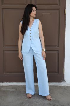 Feel confident with our Cremona stylish, luxury outfit in Sky blue! 100% high quality breathable linen vest and wide leg classic pants set will make you feel super comfortable, stylish, contemporary and classy at the same time. You will look fantastic with it in any special occasion: wedding, prom, birthday. DETAILS:     Handmade from 100% pre-washed and softened OEKOTEX certified linen for minimal to      zero shrinkage.     Designed with classic front and elastic waist in back for comfortable Blue Linen Pants Outfit, Linen Pantsuit, Pantsuit For Women, Vest And Pants Set, Summer Linen Outfits, Vest Outfits For Women, Blue Linen Pants, Trendy Vest, Linen Pants Outfit