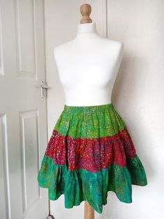 Beautiful, very summe rara style skirt.   Knee length.    Made by me from beautiful cotton batiks.   The skirt is made of three ruffles, which makes it beautifully flared.   Universal size - fits from size S to L. Comfortable elastic waistband extends from 66cm to 120cm.   It can be worn at the waist or on the hips.   larger and smaller sizes and other lengths and colors are made to order. Multicolor Mini Skirt With Ruffles, Multicolor Cotton Flared Mini Skirt, Fitted Multicolor Ruffled Mini Skirt, Multicolor Flowy Mini Skirt, Multicolor Ruffled Mini Skirt, Rara Skirt, Batik Skirt, Hippie Rock, Hippie Skirt