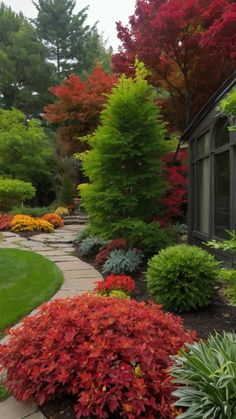 the garden is full of colorful trees and shrubs