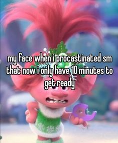 a troll with pink hair and green pants is looking at the camera, saying my face when