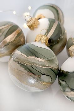 marbled glass ornaments with gold and silver accents