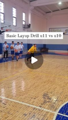 a group of young men playing basketball on an indoor court with the words basic layup drill v5 10