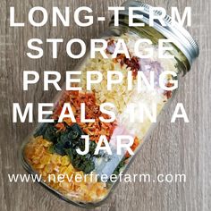 a jar filled with food sitting on top of a wooden table