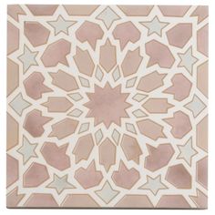 an artistic tile design in pink and white with stars on the center, as well as smaller geometric shapes