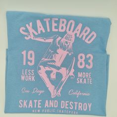 Blue t-shirt with a pink graphic of a girl skating Summer Screen Print T-shirt For Skateboarding, Urban Graphic Print T-shirt For Skateboarding, Relaxed Fit Screen Print T-shirt For Skateboarding, Destroyed T Shirt, Cotton Graphic T-shirt For Skateboarding, Graphic Tee T-shirt With Front Print For Skateboarding, Kids Skates, Skate And Destroy, Skate T Shirts