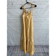 Girl And The Sun Women's Gingham Dress Mustard Blush Size 2. Condition : Good Pre-Owned Condition. No Stains, Rips, Or Tears. Measurements: Size: 2 Pit To Pit: 16” Length 52” (Collar To Bottom Hem) -Measurements Are Approximate, Please Measure And Check Your Favorite Items At Home To Estimate Fit. -Items Typically Ship Next Business Day Spring Beach Plaid Dress, Summer Plaid Dress With Tie Straps, Plaid Cotton Sundress For Vacation, Plaid Summer Dress With Tie Straps, Beach Dress With Gingham Print And Tie Straps, Spring Gingham Dress With Tie Straps, Spring Gingham Sundress With Ruffles, Gingham Sundress For Brunch, Gingham Dress With Tie Straps For Beach