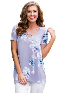 The best-selling crisscross style now in a beautiful light purple and floral print that is perfect for spring! Super soft knit, short sleeves, elegant summer top with crisscross V-neckline. Made of stretchy fabric, it is quite well received by women for cool and fresh summer styling! * Lightweight and breathable, very soft stretch fabric * Simple, chic and delightful top for spring and summer * Short sleeves, V-neck crisscross neck and floral print all over * Polyester/ Spandex Size Chart (Inche Purple Floral Print, Cheap Blouses, Wholesale Shirts, Knit Short, Ralph Lauren Womens, Women Clothing Boutique, Womens Fashion Trends, Summer Top, Purple Floral