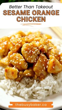 a white plate topped with sesame orange chicken