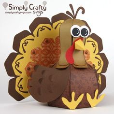 a turkey made out of paper sitting on top of a table