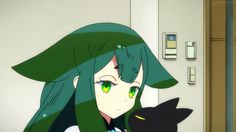 an anime character with green hair holding a black cat in front of a white wall