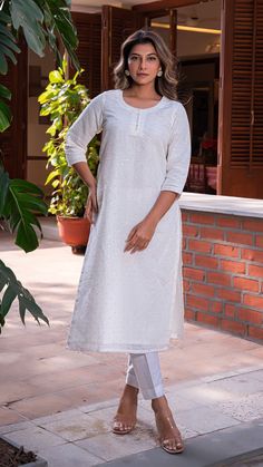 Comfortable kurta made in pure linen fabric with hand embroidered tikkis. Matching straight narrow pants. An absolute all-season essential - cool in summer and warm in winter. Features a round neck. Quarter sleeves. Fully lined kurta. Kurta Fabric : Linen. Pants Fabric : Cotton Linen. Model height is 5.6” and is wearing a size S. Wash Care : Dry Clean Only. Linen Straight Kurta With Resham Embroidery, Straight Linen Kurta With Resham Embroidery, Linen Kurta With Resham Embroidery, Traditional Linen Kurta With Resham Embroidery, Festive Unstitched Linen Kurta, Diwali Linen Straight Kurta, Unstitched Linen Straight Kurta, Fitted Kurta With Chikankari Embroidery And Straight Pants, Embroidered Linen Kurta