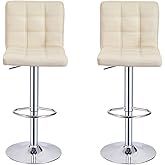 two white bar stools with chrome base and footrests, one on each side