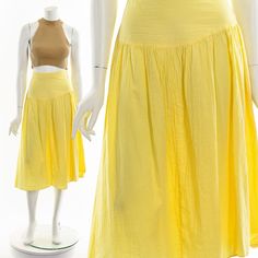 "- 70s Lemon Yellow Gauzy Cotton Midi Skirt - Zipper and Hook and Eye Closure - Natural Raise Waist Fits like:  M-L Material:  Cotton Condition:  Good to Great Clipped on Mannequin:  No ✂ SIZE + FIT ✂ Length: 31\" / 79 cm Waist: 32\" / 81 cm Hips: 50\" / 127 cm All measurements are taken with garment lying flat. ALWAYS refer to measurements as vintage sizes can vary greatly from today's modern sizes. We recommend comparing measurements above with a similar style garment you own for best fit before purchasing.  DRESS FORM / MANNEQUIN is wearing the size detailed above but she typically measures a size 4/6 by modern retail sizes or a general size small. Belt Accessories and other clothes are NOT included. ▲▲All Garments Have Been Laundered/Steamed or Dry Cleaned and are Ready-To-Wear▲▲ Are y Dress Form Mannequin, Small Belt, Cotton Midi Skirt, Skirt Zipper, Good To Great, Cotton Gifts, Beautiful Sweater, Belt Accessories, Dress Form