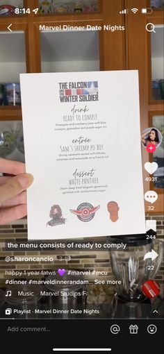 someone is holding up a menu in their kitchen