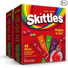 skittles are packaged in different colors and flavors, with the box on top