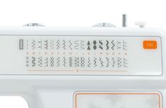 the sewing machine is white and has orange trimmings on it's sides