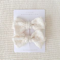 the little marshmallow bow is made from white lace