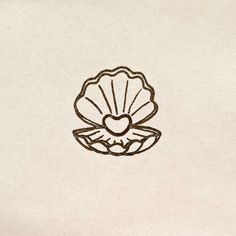 a drawing of a shell with a heart on it