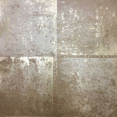 an old, grungy wall is shown in this image